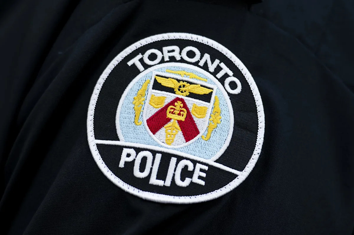 Woman dead, man arrested in Toronto apartment shooting: police