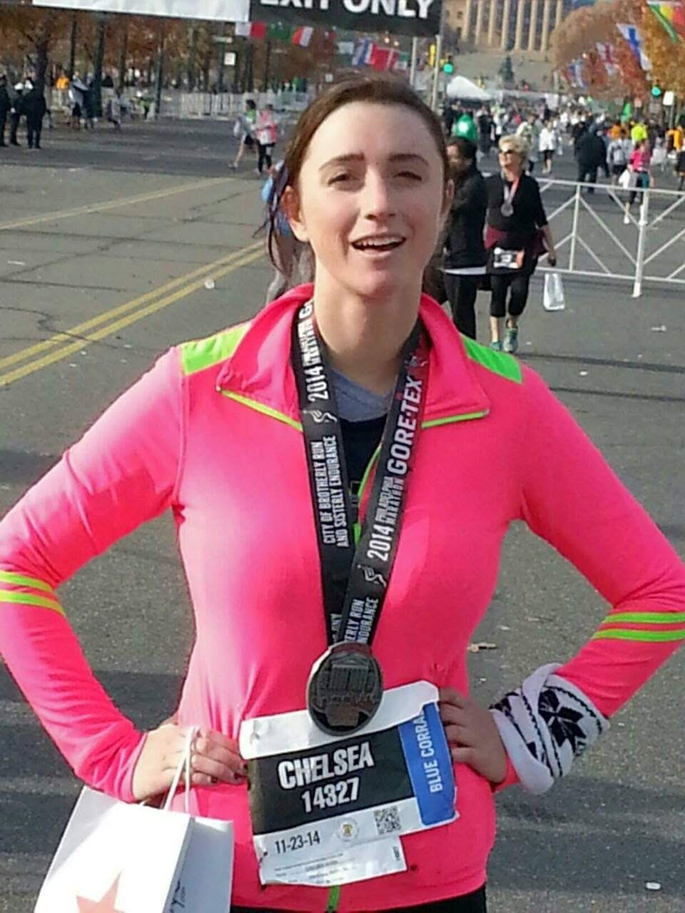 An exhausted Chelsea Gohd stands after completing the Philadelphia marathon.