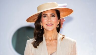 Queen Mary turns heads in a bold printed skirt and dazzling drop earrings during outing with King Frederik