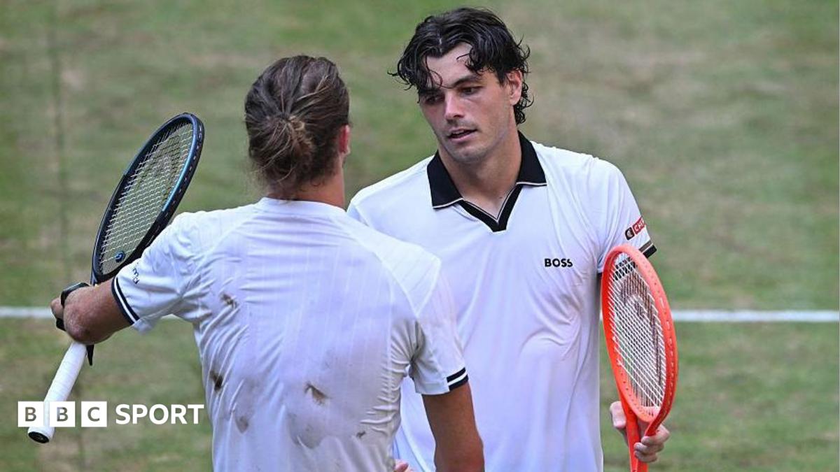 Taylor Fritz shakes hands with Alexander Zverev