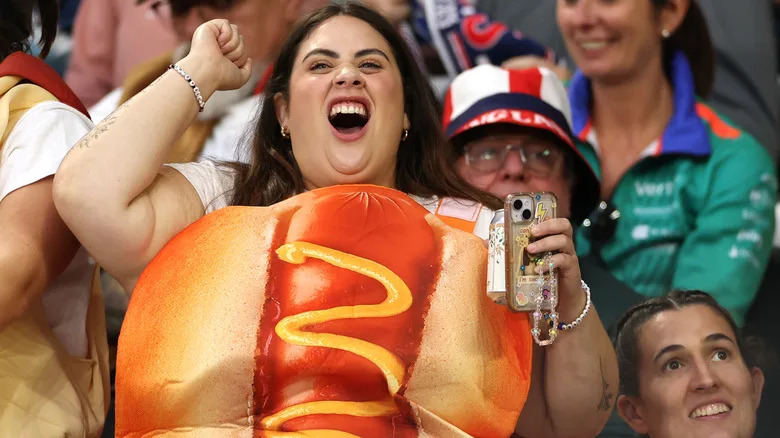 USA fans dressed as Hot Dogs celebrate the USA try during the Women's Rugby World Cup 2025 Pool A match between England and USA at Stadium of Light on August 22, 2025 in Sunderland, England. (Photo by Stu Forster/Getty Images)