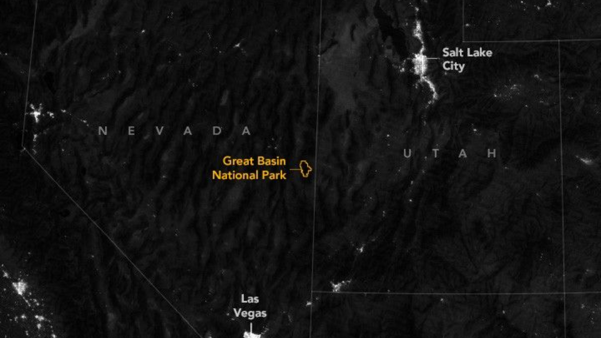 An aerial map showing Great Basin National Park as a very dark region. Nearby, Las Vegas and Salt Lake City look lit up.