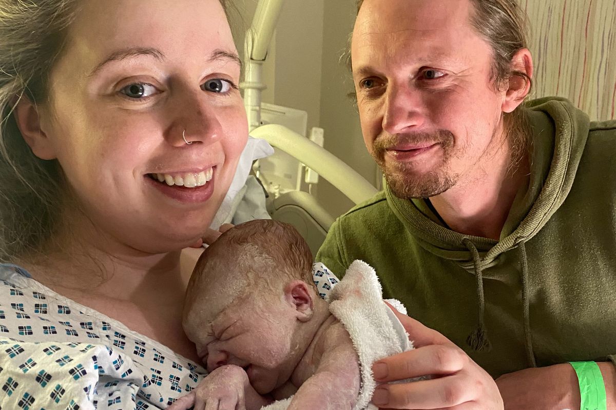 Holly Richardson and her partner Liam McCourt following the birth of their daughter Indigo