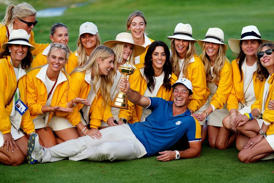 Team Europe's Viktor Hovland and players' wives with the Ryder Cup Trophy on day three of the 44th Ryder Cup on Oct. 1, 2023, in Rome.Credit: Mike Egerton/PA Images via Getty