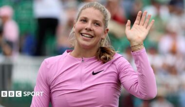 Hannah Klugman waves to the crowd after beating Harriet Dart at the Nottingham Open