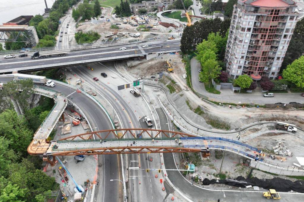 An aerial view of the Columbia Street multi-use overpass and E. Columbia exit-ramp looking west on May 6, 2026. (B.C. Ministry of Transportation)