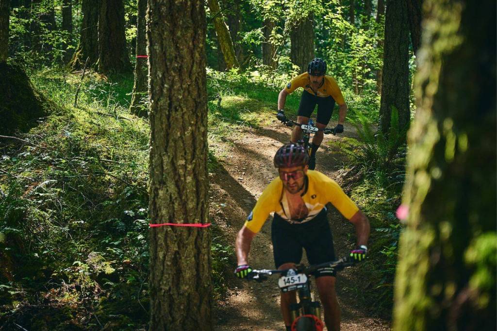 West Shore RCMP Sgt. Dave Vunic and Colwood cyclist Cody Canning captured the overall team title at the 2026 BC Bike Race. (Photo courtesy of BC Bike Race)
