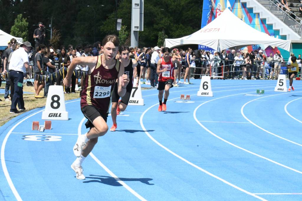 Grade 8 Saint John Paul II Academy student Lorenzo Ponce de Leon runs in the 400m track and field event at provincials in Langley last week. (Heather Coldpitts/Langley Advance Times)