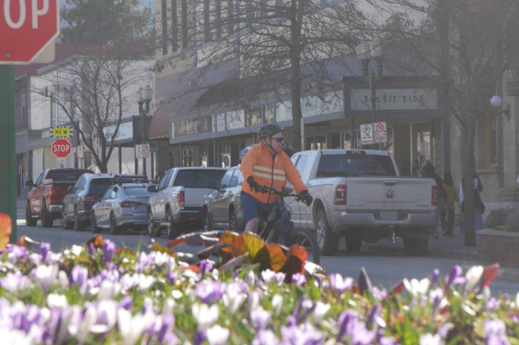 A cyclist cruises through downtown Revelstoke on April 9. (Evert Lindquist/Revelstoke Review)