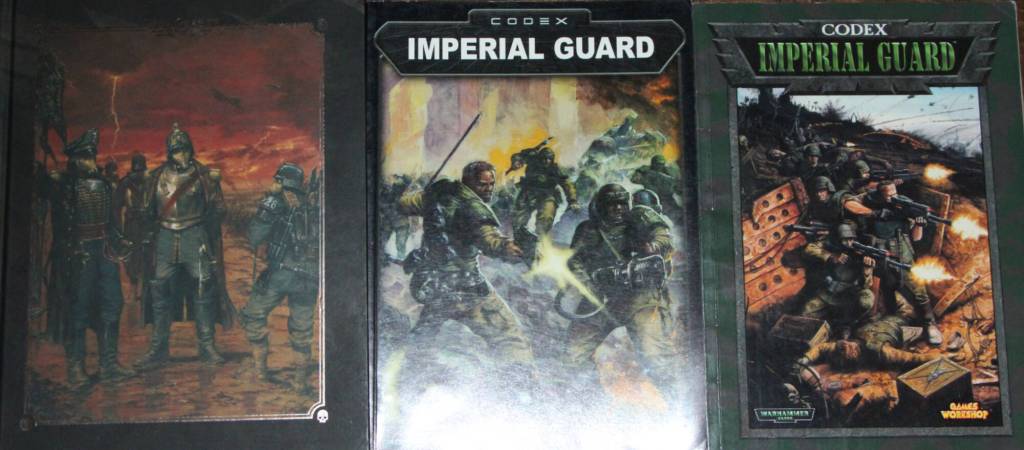 The rules for Warhammer 40,000 evolve across different editions with armies receiving new codexes each edition that outline their rules. Seen here are the 10th edition Imperial Guard Codex, the fourth edition Imperial Guard Codex and the third edition Imperial Guard Codex. (Patrick Davies photo - 100 Mile Free Press)