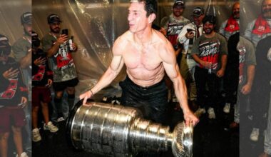 Carolina Hurricanes head coach Rod Brind&rsquo;Amour hoists the Stanley Cup in the Hurricanes dressing room following the conclusion of Game 6 in Vegas. (Photo courtesy of Carolina Hurricanes/Facebook)