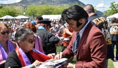World-renowned Elvis Presley tribute artist Ben Thompson signs fans&rsquo; autographs at Okanagan Lake Park in Penticton in June 2024. The festival returns to the park in 2026. (Logan Lockhart/Western News)