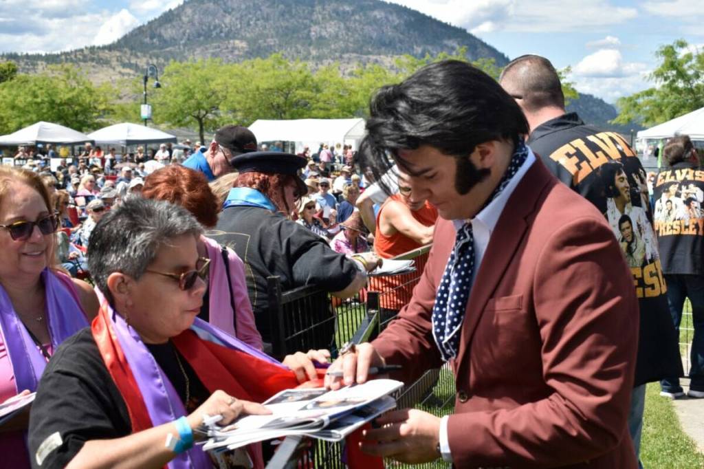World-renowned Elvis Presley tribute artist Ben Thompson signs fans&rsquo; autographs at Okanagan Lake Park in Penticton in June 2024. The festival returns to the park in 2026. (Logan Lockhart/Western News)