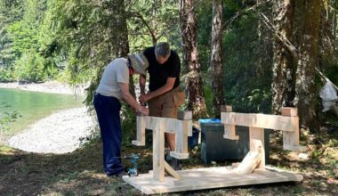 Volunteers build a new picnic table at Santiago Creek campsite on Tahsis Inlet on Vancouver Island&rsquo;s west coast. (BC Marine Trails)
