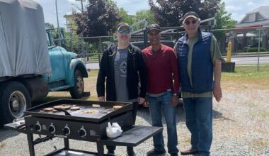 Directors from the Cloverdale Community Association (CCA) hold a BBQ at the B.C. Vintage Truck Museum in 2025&mdash;one of their many outreach events. From left: Andrew Brlic (treasurer), Ram Sabharwal (president), and Ken Bauder (VP). Sabharwal and the CCA have released the results of a recent survey which sought to get a pulse on what residents of East Surrey are thinking on a number of public issues. (Photo: Malin Jordan/Cloverdale Reporter)