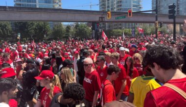 Thousands of Canadian fans in red are marching through downtown as Canada prepares to face Qatar in its first World Cup match in Vancouver. (Lauren Collins/Black Press Media)