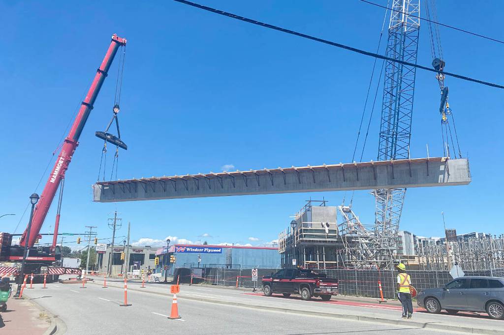 A segment of the Surrey-Langley SkyTrain guideway was hoisted into place across 203 Street on Wednesday, June 17. (Matthew Claxton/Langley Advance Times)
