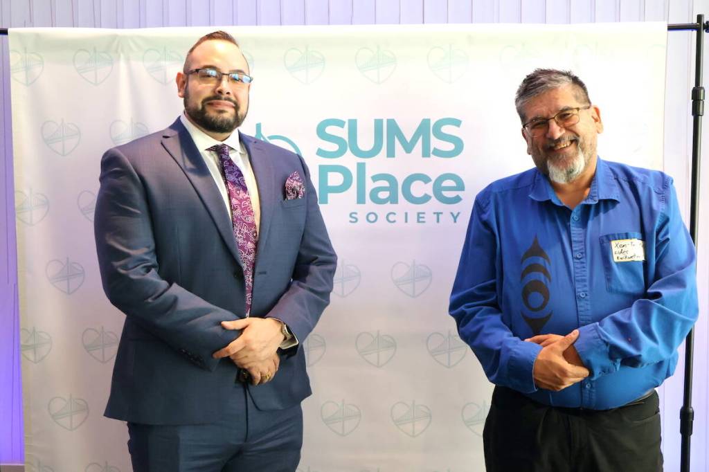 William Myers, CEO of SUMS Place Society, left, with Kwikwetlem First Nation elder Xem-Tu-Mus (Stephen Armstrong) at Civic Hotel in Surrey on June 18, 2026. (Contributed to Surrey Now-Leader)