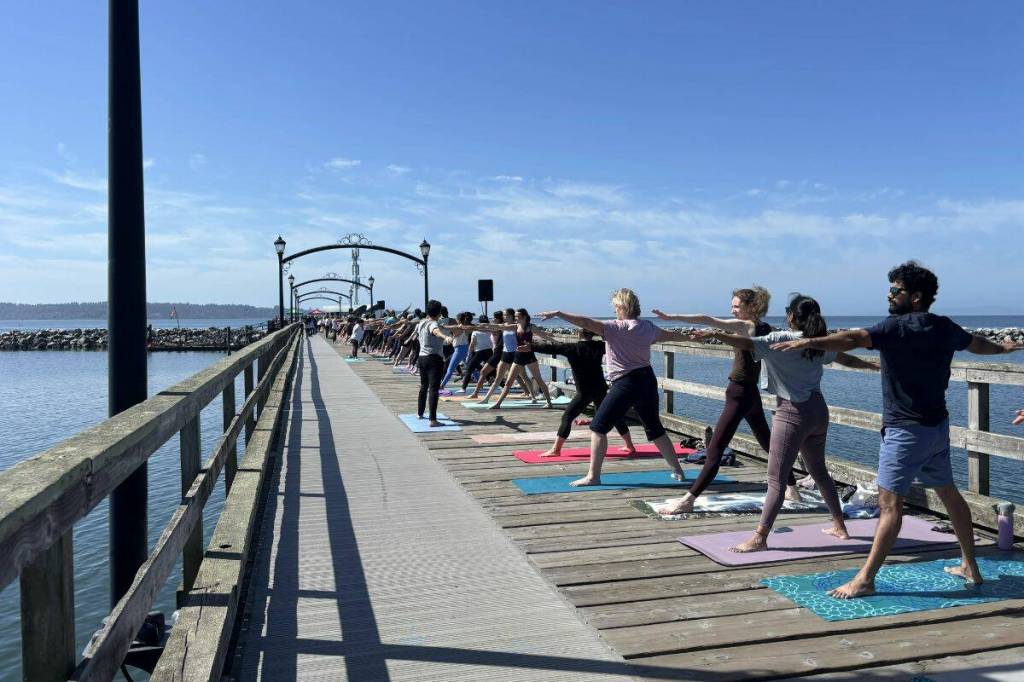 Hundreds of White Rock community members came together to celebrate International Yoga Day on June 21. (Grace McLeod/Peace Arch News)