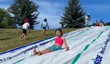 Children enjoyed the slip and slide at the City of Williams Lake&rsquo;s Canada Day party last year. (File photo)