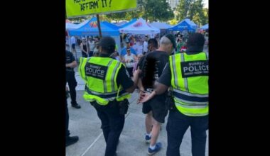 The photos posted to Facebook show the man in handcuffs, but Surrey Police media relations officer Sgt. Ali Gailus said the man had not been arrested. (Fleetwood Town Centre Community Group/ Facebook)