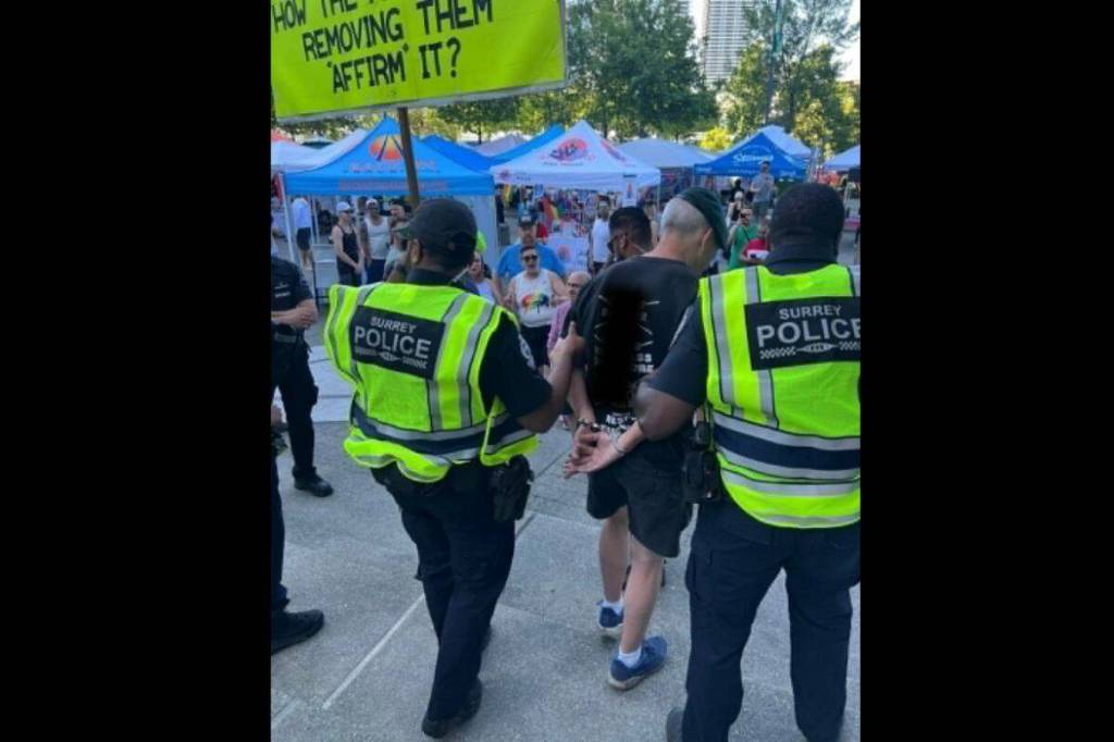 The photos posted to Facebook show the man in handcuffs, but Surrey Police media relations officer Sgt. Ali Gailus said the man had not been arrested. (Fleetwood Town Centre Community Group/ Facebook)
