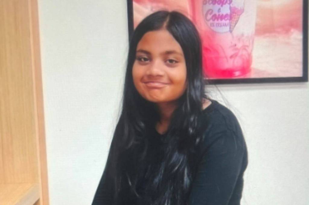 She is a South Asian female, five feet one inch tall, 150 lbs, with long black hair and brown eyes. Police say she was last seen wearing a black hoodie, grey or black pants, white shoes and a blue Nike backpack. (Surrey Police Service/ Contributed to Surrey Now-Leader)