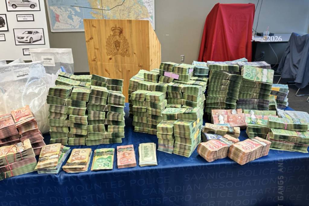 B.C.&rsquo;s anti-gang police says an investigation led by the North District Team has led to $1.5 million in cash, drugs and firearms seized in the Lower Mainland. (Combined Forces Special Enforcement Unit/handout)