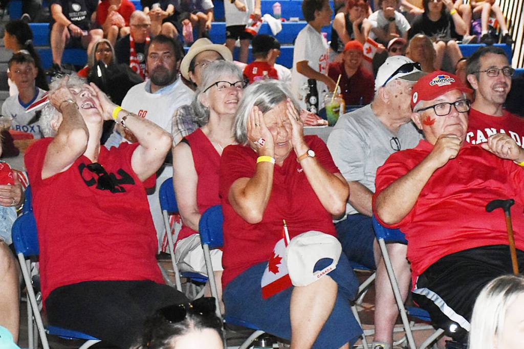 Soccer fans (from left): Judy Johnson, Nancy Berdej, and Leo Berdej, react as Canada almost scores on Switzerland during the first half of the World Cup game at a watch party hosted by the City of Pitt Meadows. (Colleen Flanagan/The News)
