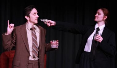 Kay Knighting as Richard Hannay and Abigail Walkner, as one of numerous supporting characters, in a tense moment from White Rock Players Club&rsquo;s The 39 Steps at Oceana PARC Playhouse July 2 to July 19. (Contributed to Peace Arch News)