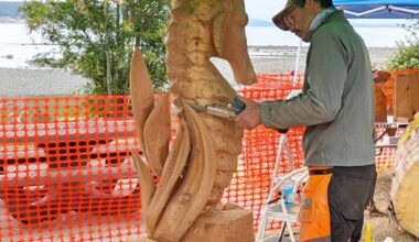 Newcomer Aaron Grant works on the smaller details of the seahorse at the Transformation on the Shore, June 25, 2026. (Kari Fredheim/Campbell River Mirror)