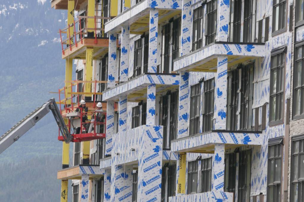 Construction crews work on the Cabot Revelstoke Mountain Lodge at Revelstoke Mountain Resort on May 13. (Evert Lindquist/Revelstoke Review)