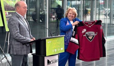 Surrey Mayor Brenda Locke holds a Vancouver Giants hockey jersey while Ron Toigo, team president and majority owner, speaks during a news conference at Surrey City Hall to announce the city&rsquo;s new 10,000-seat arena plans, on Tuesday, June 20, 2026. (Tom Zillich/Surrey Now-Leader)