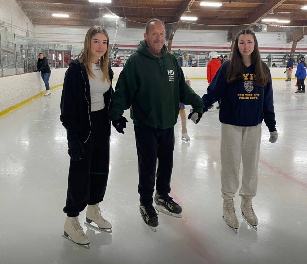 Supplied photo
Marc Lafleur is seen here teaching two homestay students, Sofia and Fernanda, to skate.