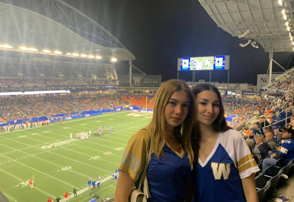 Supplied photo
Homestay students Sofia and Fernanda are pictured at a Winnipeg Blue Bombers game.