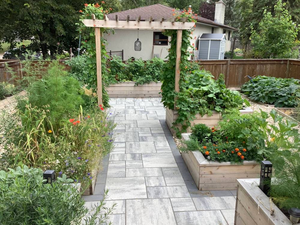 LYNNE HERMISTON PHOTO
A food gardener’s delight: visit a raised bed garden filled with veggies and herbs on this year’s MMGA garden tour.