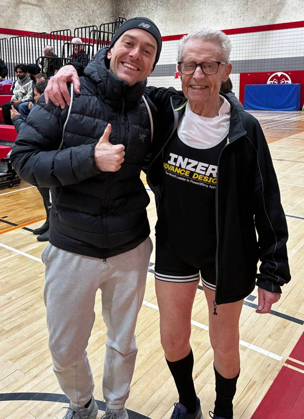SUPPLIED
Elliott celebrates his weightlifting record
with his grandson, Derek Elliott, earlier
this year.