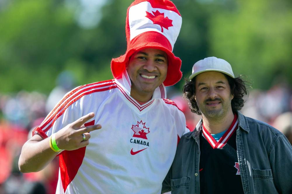 BROOK JONES / FREE PRESS
Footie fans Brian Triminio, 34, and Jackson Grier, 44, attend the watch party.