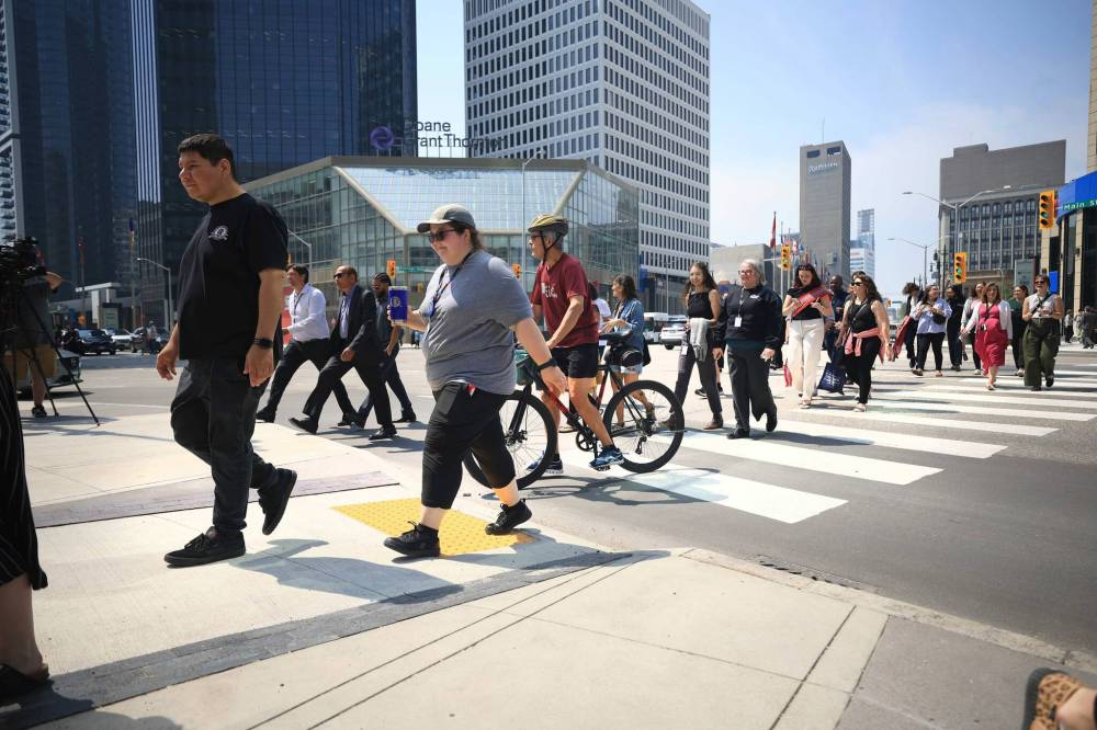 RUTH BONNEVILLE / FREE PRESS FILES
                                Saturday marks the one-year anniversary of the intersection’s reopening to foot traffic.