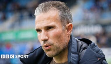 Close up of Robin van Persie wearing a thick coat