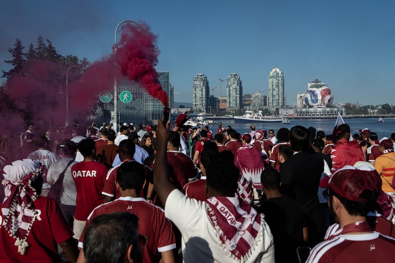 Qatar fans march