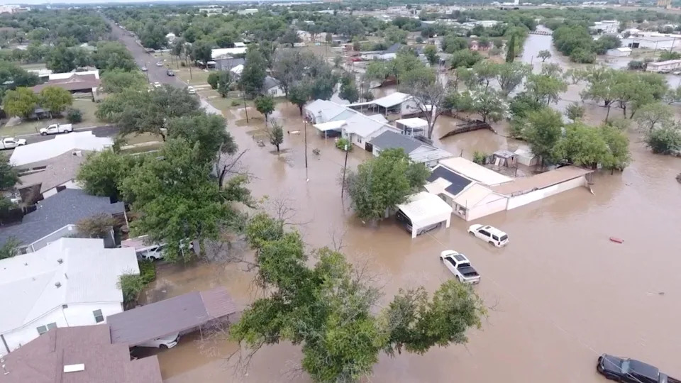 A drone view shows flooded houses, following torrential rains that unleashed flash floods along the Concho River in San Angelo, Texas, U.S., July 4, 2025, in this screen grab obtained from a social media video. Correction: An earlier version of this caption misidentified the river that caused the flooding.