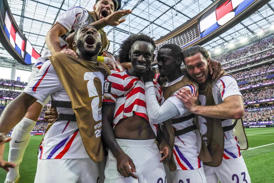 INGLEWOOD, CA - JUNE 12, 2026: United States of America forward Folarin Balogun (20), center, celebrates with teammates after his second goal during the first half of a World Cup group stage match between United States and Paraguay at the SoFi Stadium on Friday, June 12, 2026 in Inglewood, CA. (Robert Gauthier / Los Angeles Times via Getty Images)