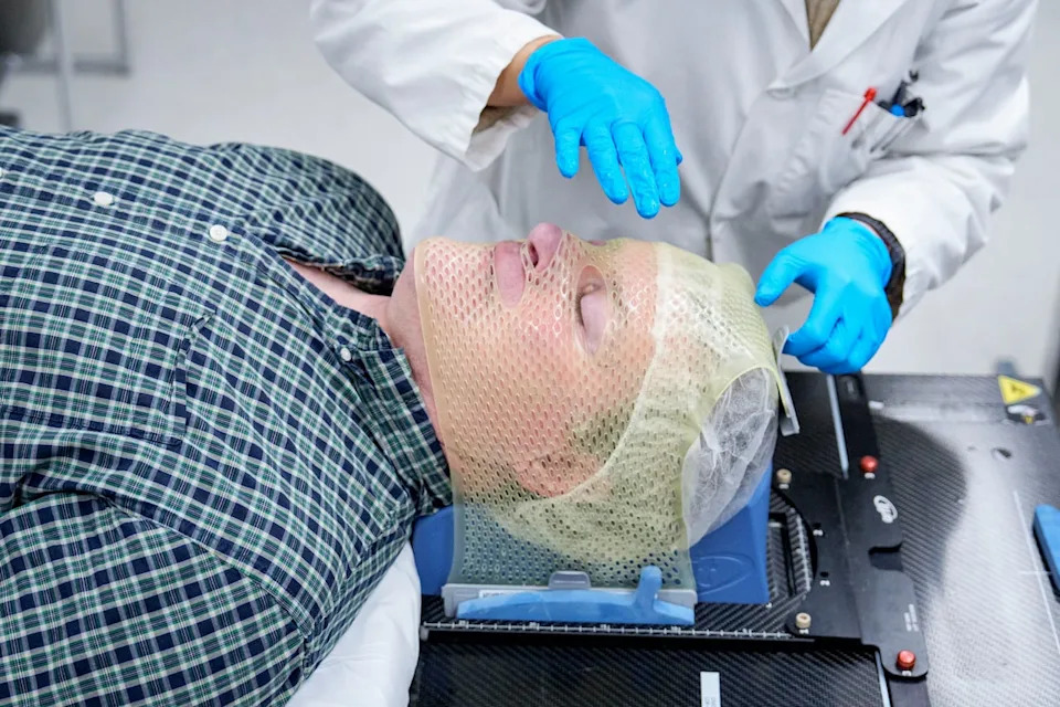 Brendan Hynes is fitted for a mesh mask to stabilize his head before a brain scan at Toronto's Centre for Addiction and Mental Health. Hynes has suspected chronic traumatic encephalopathy, or CTE, and is taking part in a study to — for the first time — diagnose the disease in living patients.