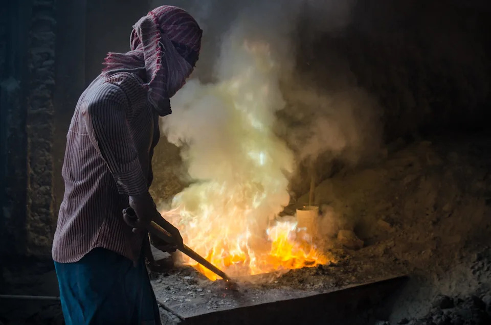 Industrial processes like metal smelting can release heavy metals into the environment