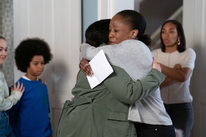 564796,TITLE:Eastenders Denise hugs Libby tightly as Raymond and Chelsea watch on in EastEnders