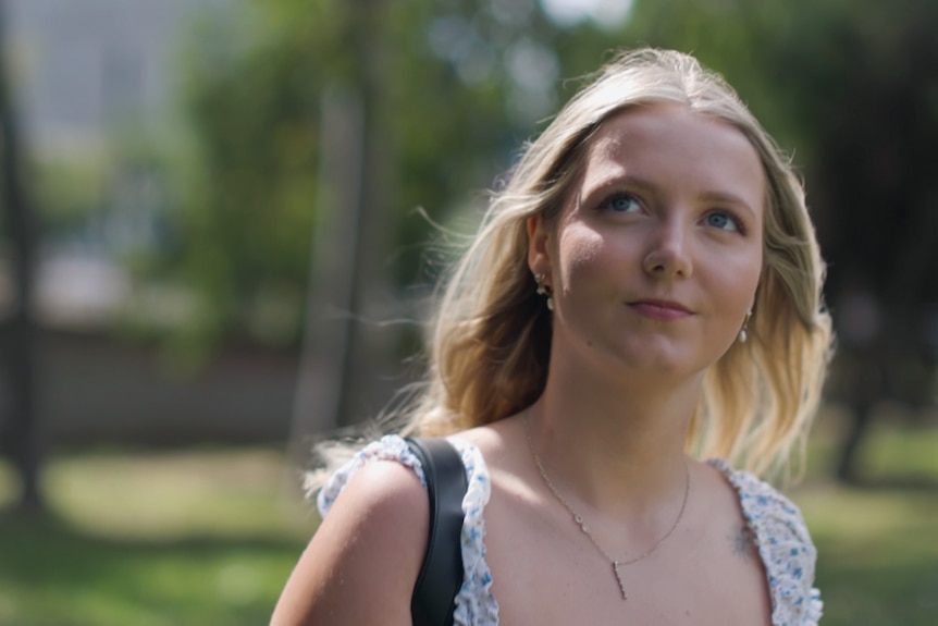 Young woman Clara pictured outside
