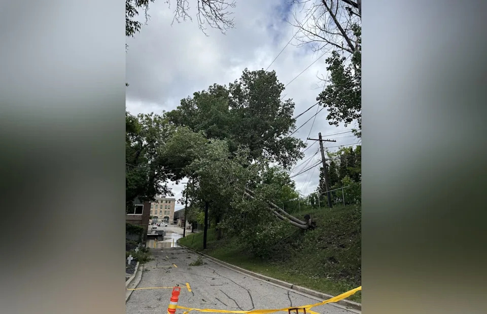 Manitoba Hydro says thousands of customers are still without power after a storm downed power cables and poles.