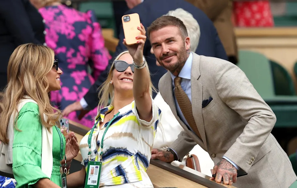 David Beckham poses for a selfie with a fan from the Royal Box (Getty)