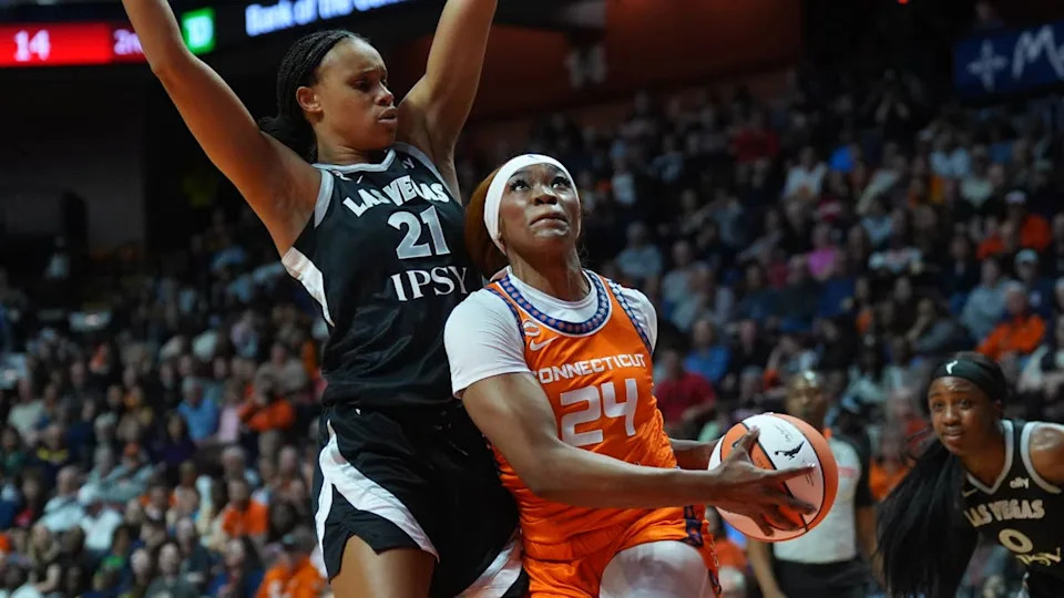 May 13, 2026; Uncasville, Connecticut, USA; <a class="link " href="https://sports.yahoo.com/wnba/teams/connecticut/" data-i13n="sec:content-canvas;subsec:anchor_text;elm:context_link" data-ylk="slk:Connecticut Sun;sec:content-canvas;subsec:anchor_text;elm:context_link;itc:0" data-yga="{"yLinkElement":"context_link","yModuleName":"content-canvas","yLinkText":"Connecticut Sun","ySubModuleName":"anchor_text","yHasCommerce":false}">Connecticut Sun</a> forward <a class="link " href="https://sports.yahoo.com/wnba/players/10212/" data-i13n="sec:content-canvas;subsec:anchor_text;elm:context_link" data-ylk="slk:Aneesah Morrow;sec:content-canvas;subsec:anchor_text;elm:context_link;itc:0" data-yga="{"yLinkElement":"context_link","yModuleName":"content-canvas","yLinkText":"Aneesah Morrow","ySubModuleName":"anchor_text","yHasCommerce":false}">Aneesah Morrow</a> (24) drives the ball against Las Vegas Aces forward Brianna Turner (21) in the first half at Mohegan Sun Arena. Mandatory Credit: David Butler II-Imagn Images© David Butler II-Imagn Images&period;